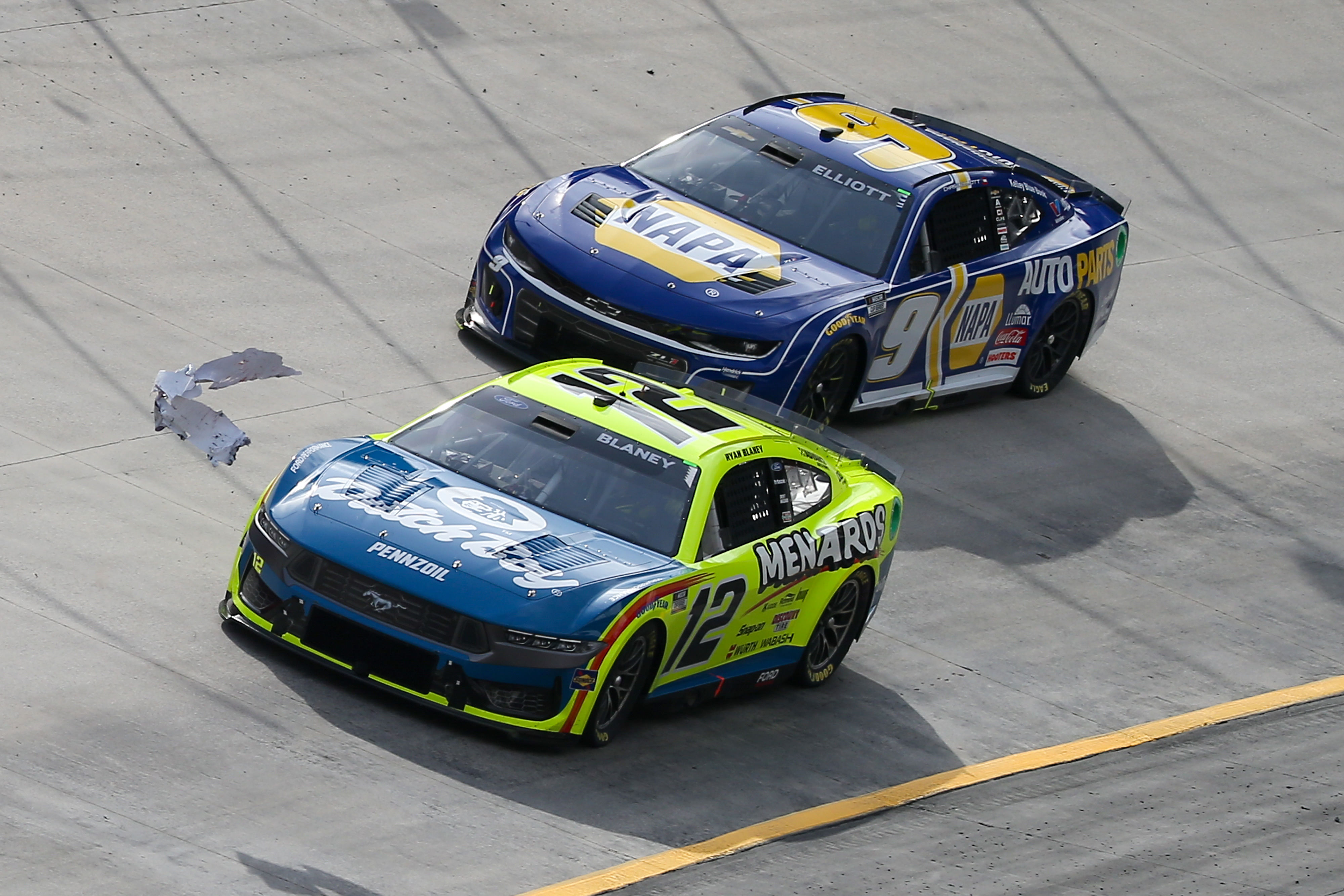 Ryan Blaney (#12) and Chase Elliott (#9) at Bristol Motor Speedway last year - Source: Imagn